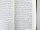 an open book that is sitting on a table