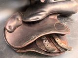 a close up of a pair of leather shoes on a table