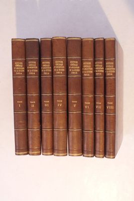 six livres marron sont alignés sur une surface blanche