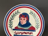 a close up of a plate with a picture of a person on it