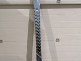 a pair of skis leaning up against a garage door