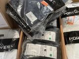 boxes of men ' s clothing are stacked on top of each other