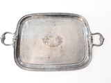 a silver tray with a handle and handles on it