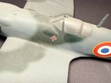 a model of a fighter plane on display on a table