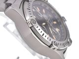 a close up of a watch on a white background