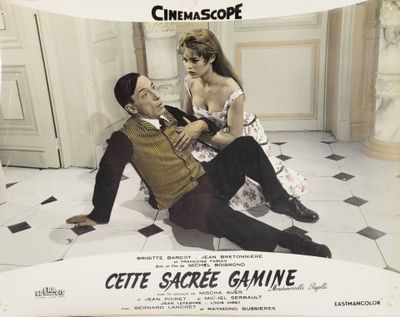 movie poster of a man and a woman sitting on a tiled floor