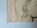 a drawing of a woman ' s face on a piece of paper