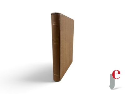an image of a brown book sitting on top of a white surface