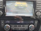 a picture of a car dashboard with a camera mounted on it