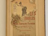 un livre ouvert avec l'image d'un homme et d'un chien