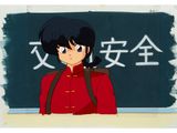 an image of a woman in a red uniform stands in front of a chalkboard