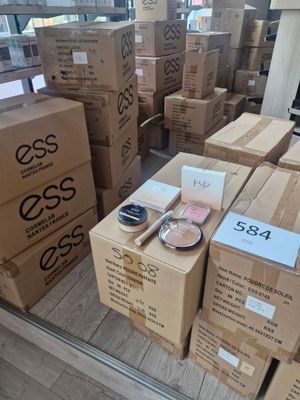 many boxes of cosmetics on display in a store window