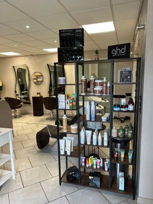 a picture of a salon with a lot of hair products on display