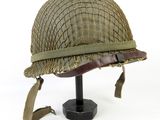 an image of a helmet on a stand on a white background