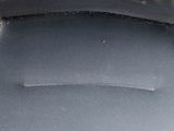 the seat of a car with a hole in the middle of it