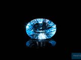 a blue diamond on a black background