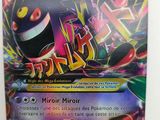 gros plan d'une carte pokemon sur une surface blanche