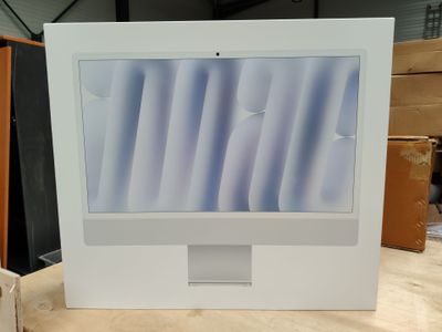 a picture of a computer monitor sitting on top of a table