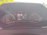 a close up of a car dashboard with a speedometer and gauges