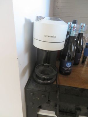 a coffee maker that is sitting on top of a counter