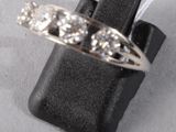 a picture of a ring with three diamonds on it
