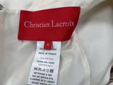 a label on a white shirt that says christian lacroix