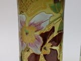 two vases that have been decorated with flowers on them