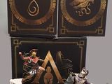 two figurines of a man and a woman with a sword and shield
