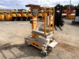 an image of a forklift parked in a parking lot