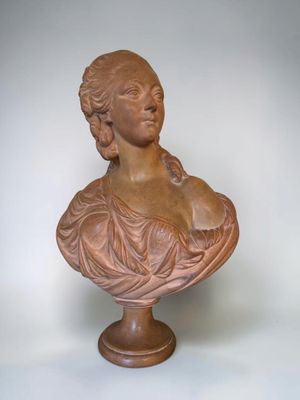 bust of a woman on a pedestal on a white background