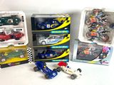 a lot of toy cars in the boxes on the table
