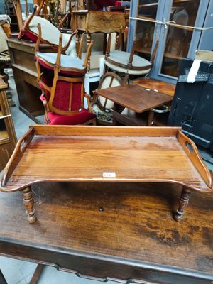a wooden tray that is sitting on top of a table
