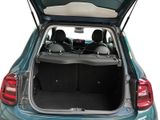 the back of a blue car with its trunk open and the back seats down