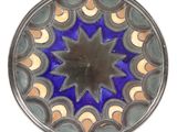 a picture of a glass plate with a star design on it