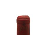 a bottle of wine that is sitting on a table