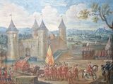 un tableau accroché au mur d'un château, sur lequel on voit beaucoup de personnages