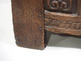 a close up of a wooden table with a clock on it