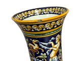 a vase with a design on it on a white background