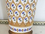 a vase that is sitting on a marble table