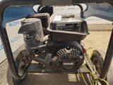 an image of a gas powered generator on a cart
