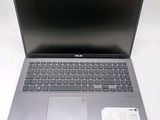 an open laptop computer sitting on top of a white table