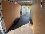 a view of the inside of a van with the door open