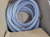 a box with a hose in it on the floor