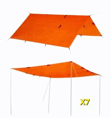 an image of two orange tarps with the letters x and x on them