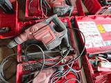 many tools that are in a red box on the floor