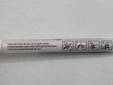 a close up of a pen on a table with a white background