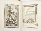 a book open to a picture of a man on a horse