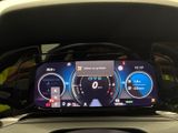 the dashboard of a car with a digital display on it