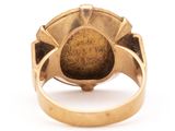 an image of a gold ring with a brown stone in it