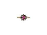 a close up of a pink stone ring on a white background